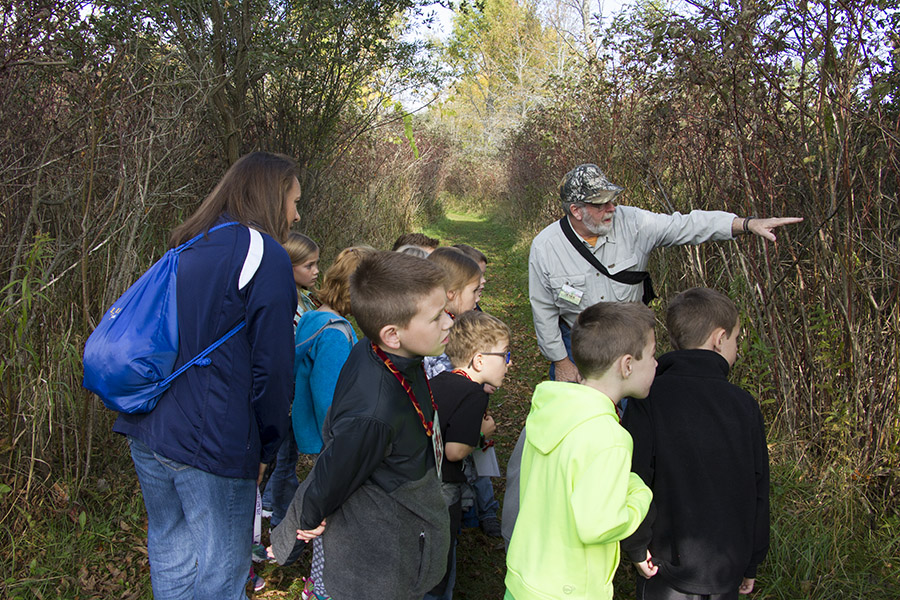 Mark teaching kids about nature on the trail.