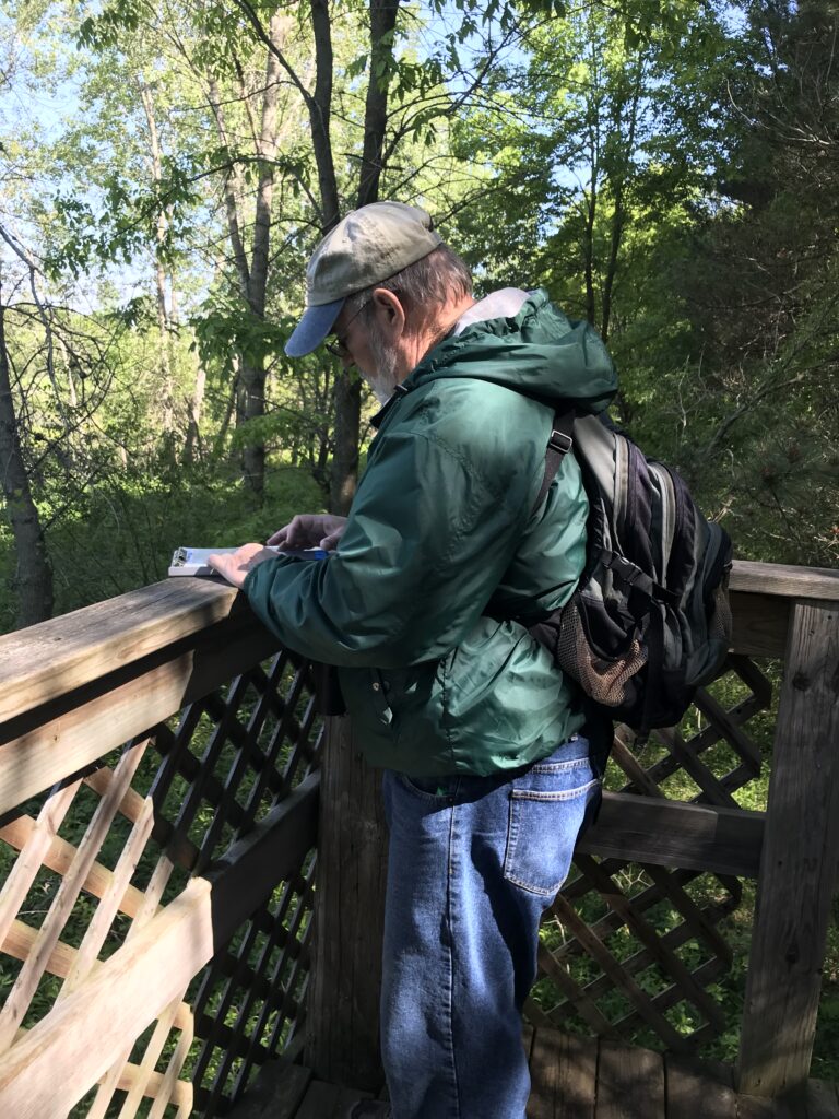 Jim Knickelbine performing a bird survey